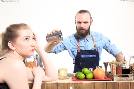 drunk girl clings to the bartenders. white backgroundの写真素材