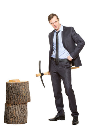 office worker, manager, businessman in suit and tie with a pickaxe. isolated on a white background. allegory.の写真素材