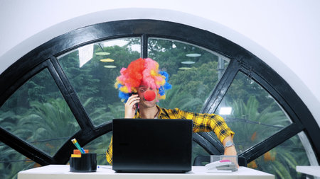 allegory concept, office worker. Clown manager in the office