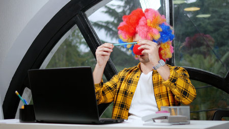 allegory concept, office worker. Clown manager in the office
