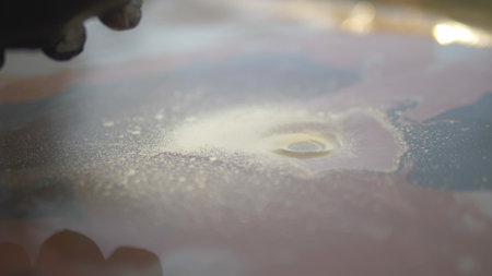 abstract background, blur. Workshop of liquid acrylics. Fluid art. fill with acrylic paint on canvas. Creative work.の写真素材