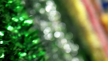 abstract background, shiny christmas tinsel. blur, selective focus. copy spaceの写真素材