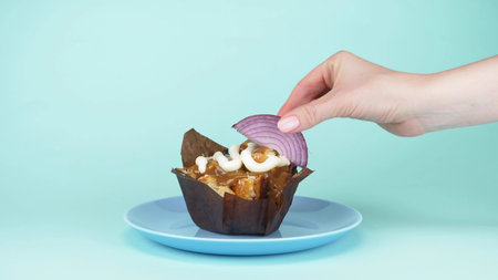 Fashionable food design. onion slice put on a cream cake