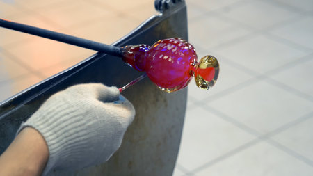 glassblower. craft manufacturing of glass products