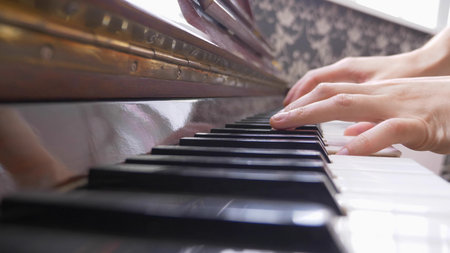 closeup. male hands playing the piano. copy space.の写真素材