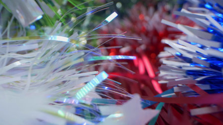 extreme close-up, detailed, bright shiny metallic tinsel. christmas backgroundの写真素材
