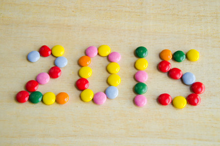 2015 with coated chocolate candyの写真素材