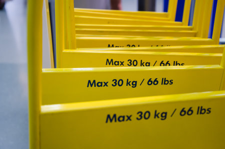 Maximum weight yellow trolleyの写真素材