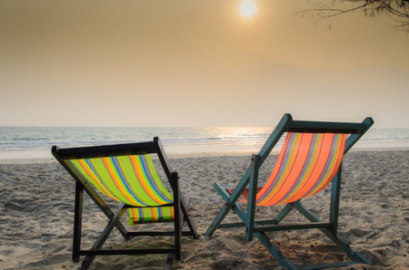 Two beach chairs on mae rumphueng beach, rayong ,thailandの写真素材
