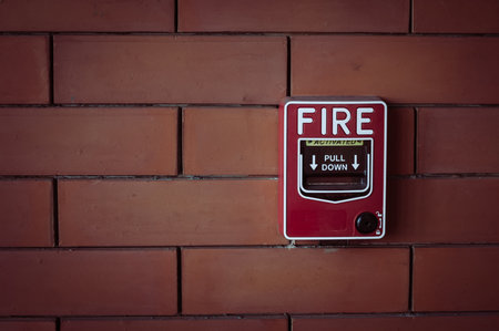 fire alarm on brick wallの写真素材