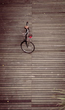 bicycle on the wooden floorの写真素材