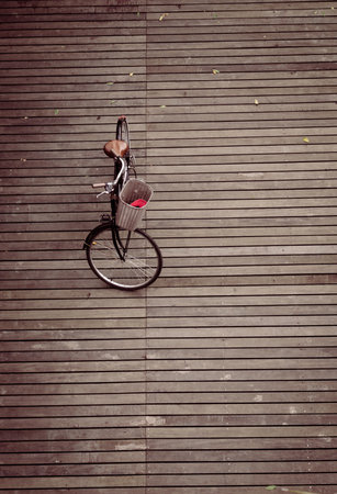 bicycle on the wooden floor の写真素材