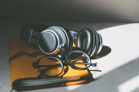 Relax time!! Headset, glasses and diary soft focus and selective focus  Image ID:3の写真素材