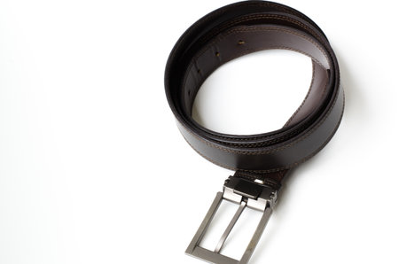 The belt is made from brown leather