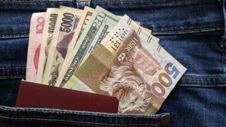 Background of detail blue denim Jeans with back pocket white smart phone