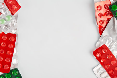 Pills on a white background concept. Flat lay and copy spaceの写真素材