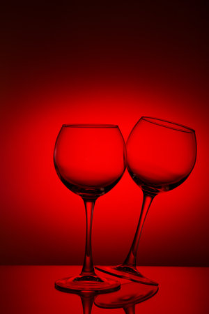 Wine glasses composition on red.のeditorial素材