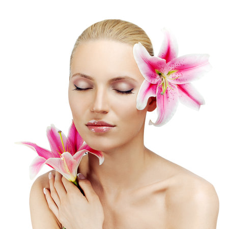 beautiful woman with a flowerの写真素材