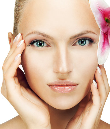 beautiful woman with a flowerの写真素材
