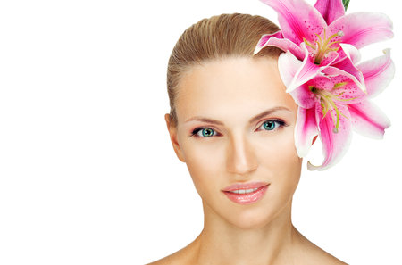 beautiful woman with a flowerの写真素材