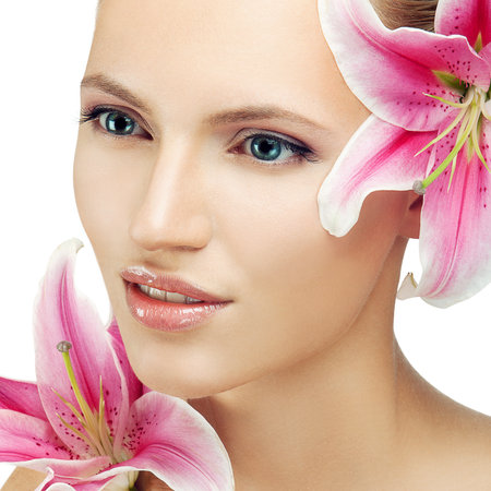beautiful woman with a flowerの写真素材