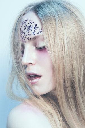 Portrait of the woman with beautiful eyes on white backgroundの写真素材