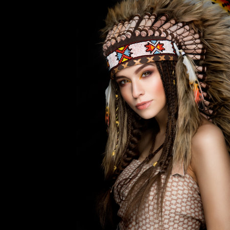 Beautiful ethnic lady with roach on her head. Indianの写真素材