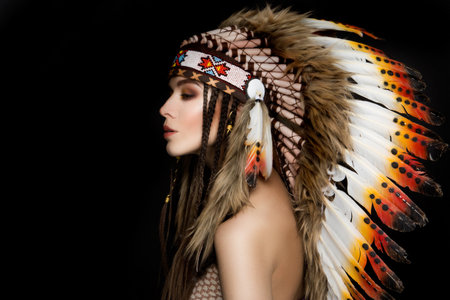 Beautiful ethnic lady with roach on her head. Indianの写真素材