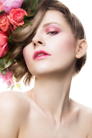 Beautiful lady with a wreath of flowersの写真素材