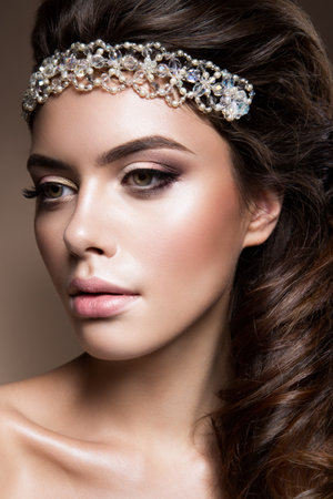 Close-up portrait of beautiful woman with bright make-up. Curly Hair. Beautiful bride.の写真素材