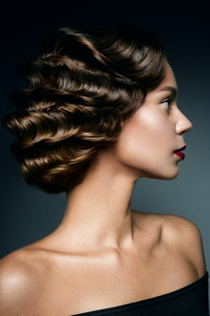 Retro Woman Portrait with beautyful hairstyle and make up.の写真素材