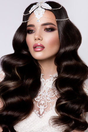 Fashion Beauty Model Girl with curly Hair. Bride.の写真素材