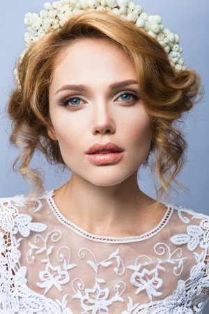 Make up. Glamour portrait of beautiful woman model with fresh makeup and romantic wavy hairstyle.の写真素材
