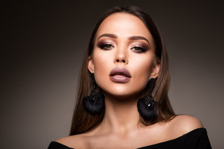 Beautiful woman with professional make upの写真素材