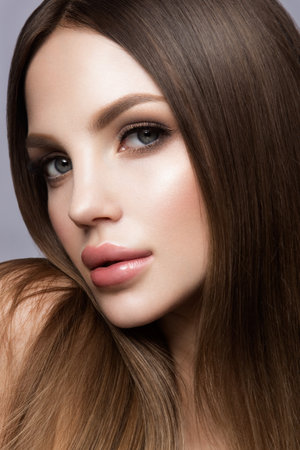Beauty Woman face Portrait. Beautiful model Girl with Perfect Fresh Clean Skinの写真素材