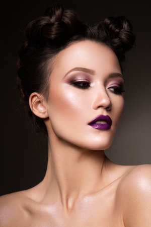 Beautiful woman with professional make upの写真素材
