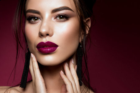 Gorgeous Young Brunette Woman face portrait.の写真素材