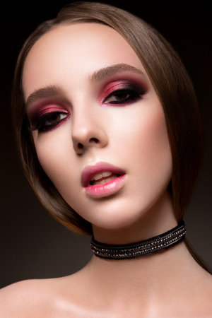 Beauty fashion model girl with bright makeupの写真素材