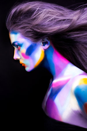 Halloween. Portrait of young beautiful girl with art make upの写真素材