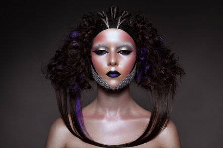 Beautiful girl portrait with creative make upの写真素材