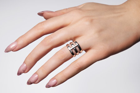 Beautiful white manicure with glitter. Nude manicureの写真素材