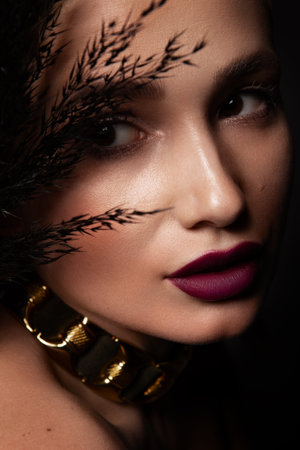 Close-up portrait of beautiful woman with bright make-upの写真素材