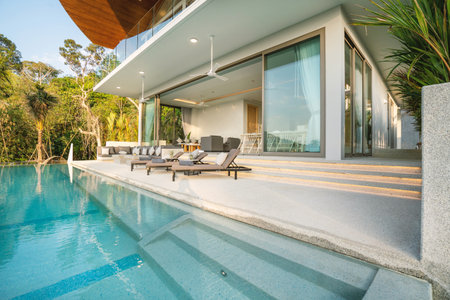 Interior and exterior design of luxury pool villa, house and home feature terrace and sun bedの写真素材