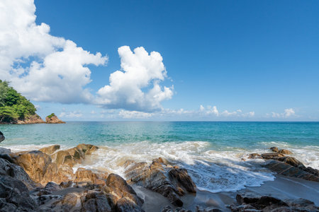 Summer  beach Ocean view with blue sky , white sand  and wave .backgroundの写真素材