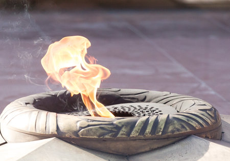 Eternal flame at the memorial to fallen soldiers