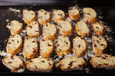 Homemade Italian biscotti biscuits on a baking panの写真素材