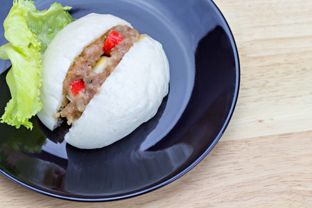 Chinese steamed bun with crab stick, quail egg and pork stuffの写真素材