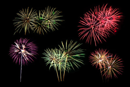 Colorful fireworks of various colors on black backgroundの写真素材