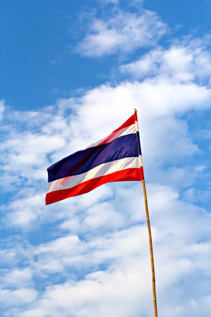 Thai nation flag on wooden poleの写真素材