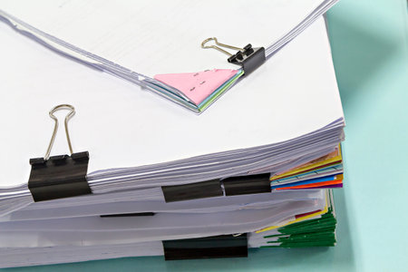 Close up of business documents stack on desk , report papers stackの写真素材